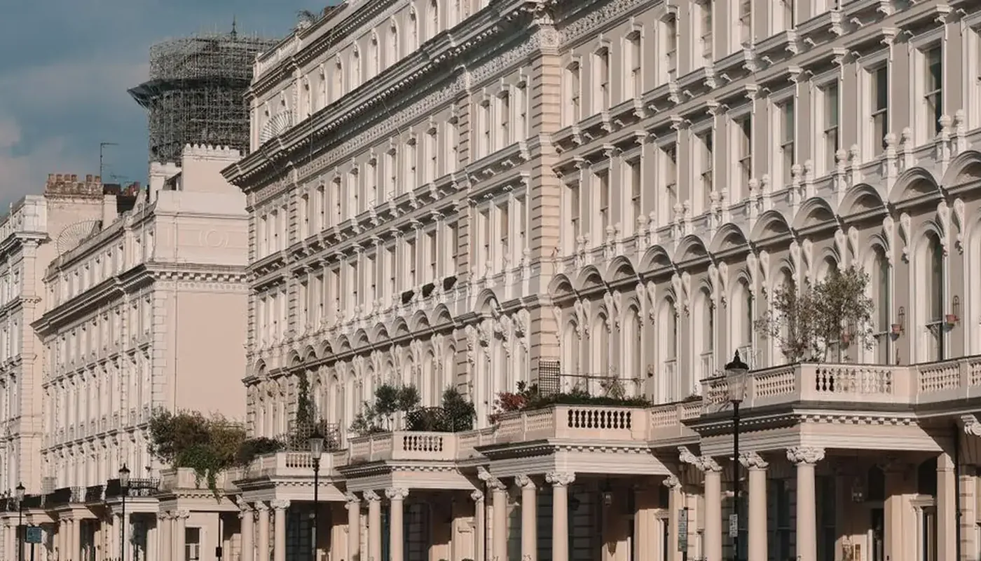 A long row of white stucco London townhouses, the kind of stock letting agents now market under the rules that changed on 1 May 2026